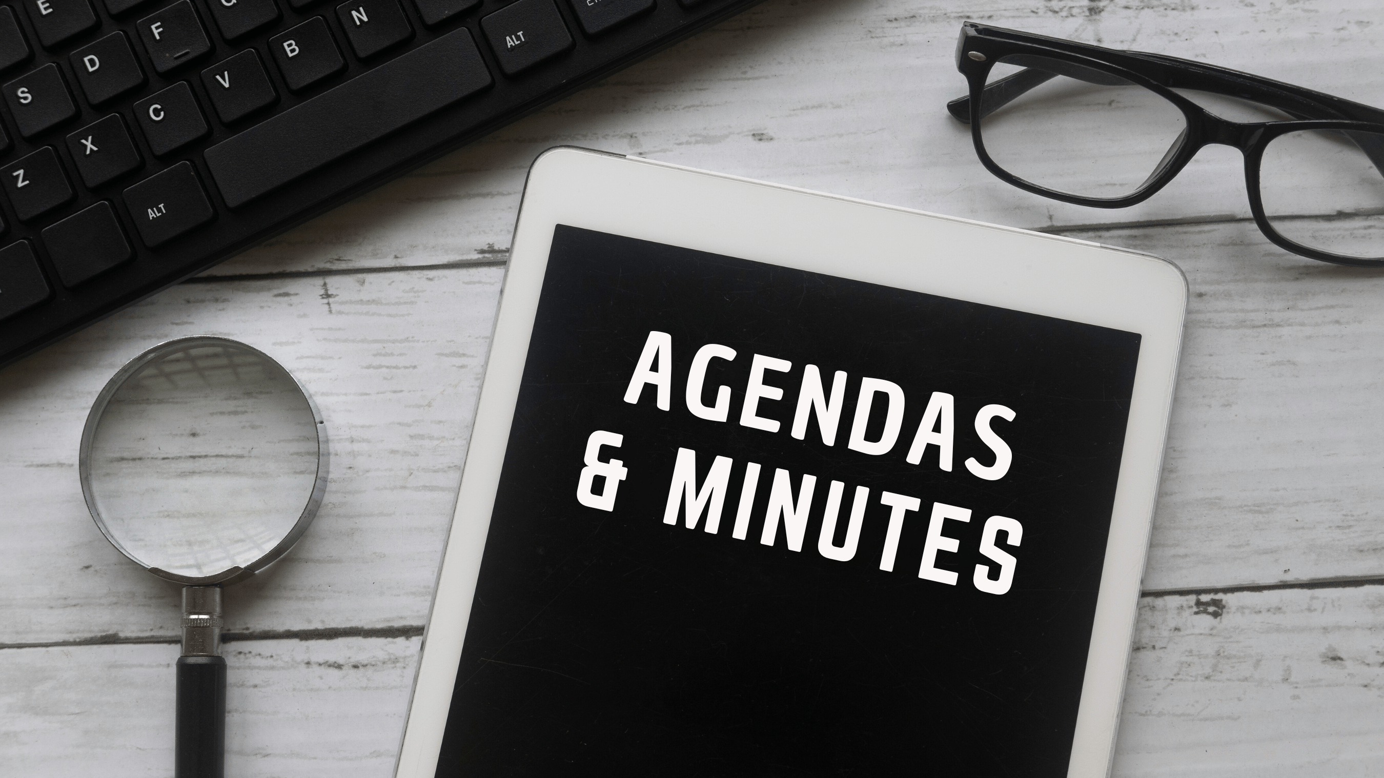 tablet showing the words agendas and minutes